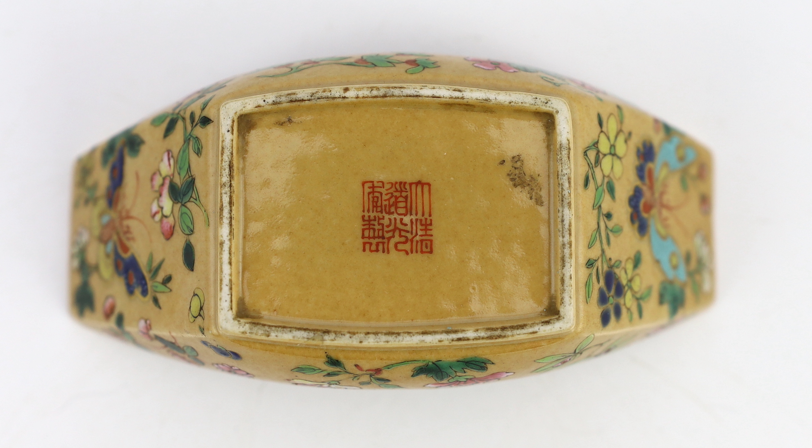 A Chinese enamelled porcelain ingot-shaped cup stand, Daoguang seal mark and of the period (1821-50)